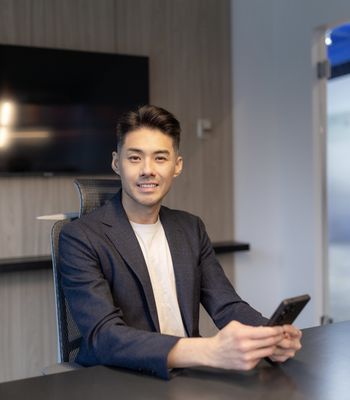 Portrait of Alex Chen, Licensed Realtor.